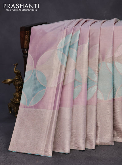 Pure kanchipuram tissue silk saree pastel pink with allover zari weaves and silver zari woven border