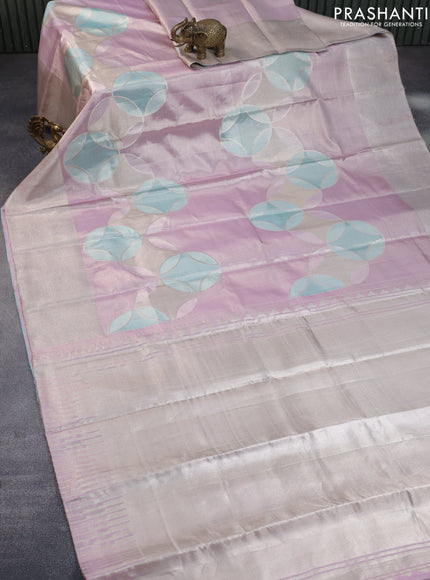 Pure kanchipuram tissue silk saree pastel pink with allover zari weaves and silver zari woven border