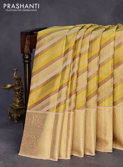 Pure kanchipuram tissue silk saree yellow and cream with allover stripes pattern and zari woven border