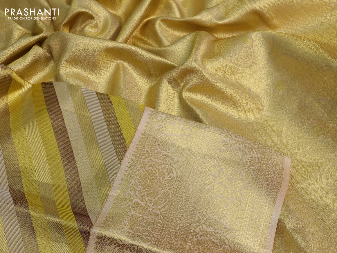 Pure kanchipuram tissue silk saree yellow and cream with allover stripes pattern and zari woven border