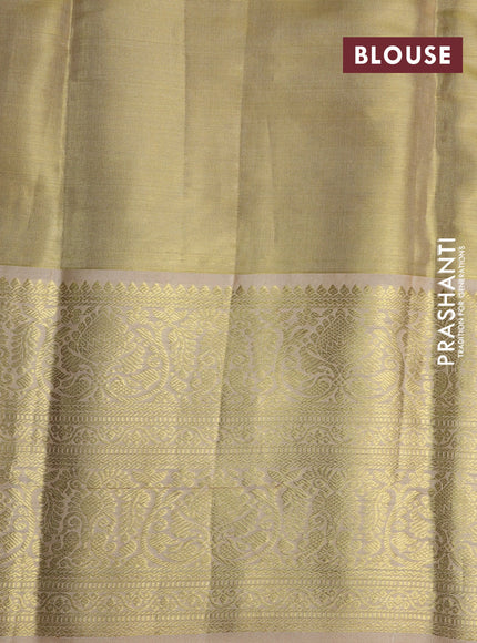 Pure kanchipuram tissue silk saree yellow and cream with allover stripes pattern and zari woven border