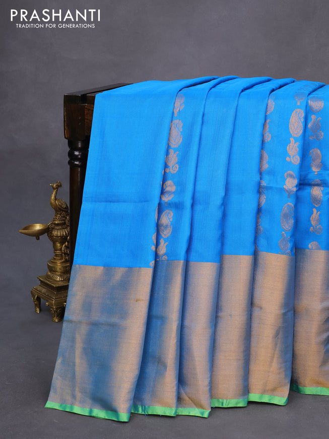 Pure uppada silk saree cs blue and parrot green with allover zari woven paisley buttas and long zari woven border