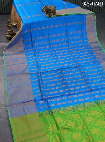 Pure uppada silk saree cs blue and parrot green with allover zari woven paisley buttas and long zari woven border