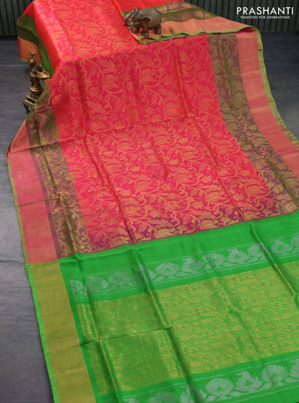 Pure uppada silk saree dual shade of pinkish orange and parrot green with allover zari woven brocade weaves and long zari woven border