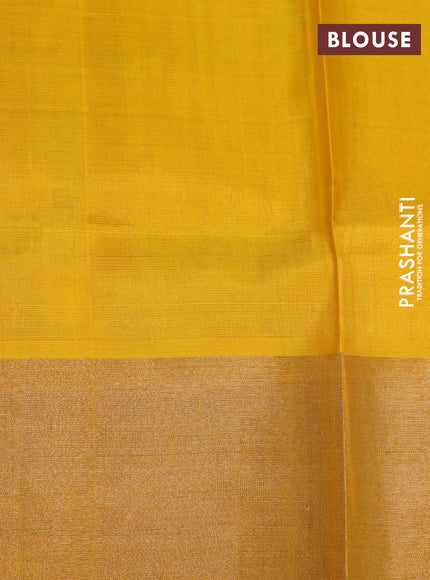 Pure uppada silk saree blue and yellow with allover zari woven brocade weaves and long zari woven border