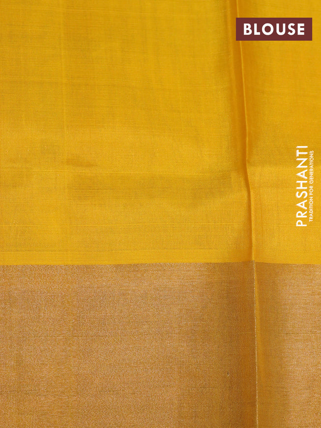 Pure uppada silk saree blue and yellow with allover zari woven brocade weaves and long zari woven border