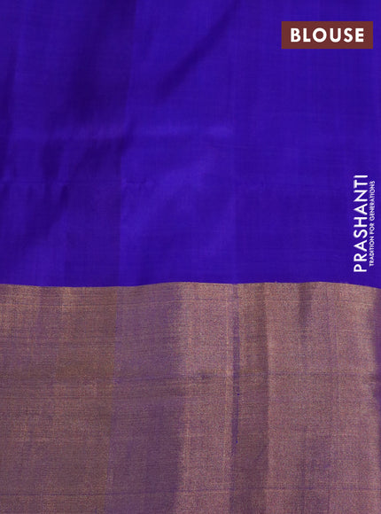 Pure uppada silk saree orange and blue with allover zari woven brocade weaves and long zari woven border