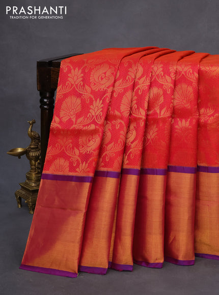 Pure uppada silk saree dual shade of pinkish orange and blue with allover zari woven brocade weaves and long zari woven border