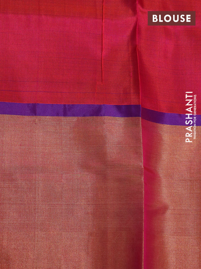 Pure uppada silk saree dual shade of pinkish orange and blue with allover zari woven brocade weaves and long zari woven border