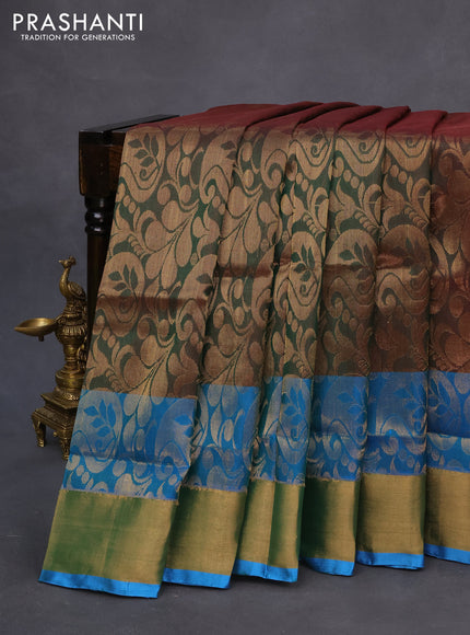 Pure uppada silk saree dual shade of greenish maroon and cs blue with allover zari woven brocade weaves and long zari woven border