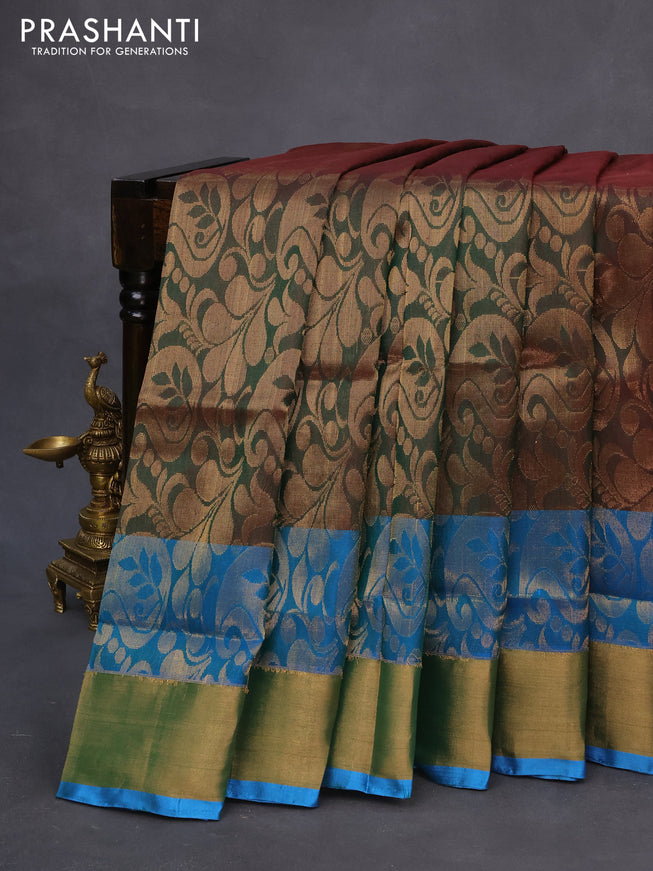 Pure uppada silk saree dual shade of greenish maroon and cs blue with allover zari woven brocade weaves and long zari woven border