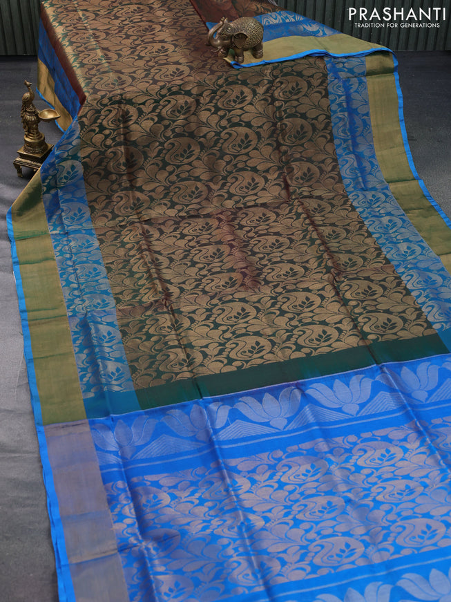 Pure uppada silk saree dual shade of greenish maroon and cs blue with allover zari woven brocade weaves and long zari woven border