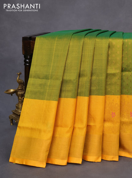 Pure uppada silk saree dual shade of green and yellow with allover zari woven butta weaves and floral design zari woven border