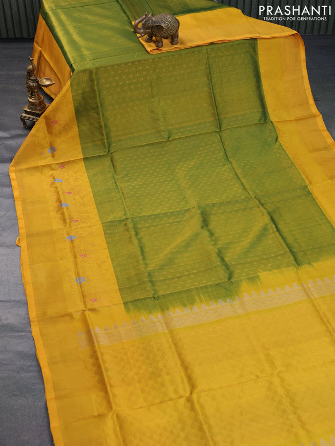 Pure uppada silk saree dual shade of green and yellow with allover zari woven butta weaves and floral design zari woven border