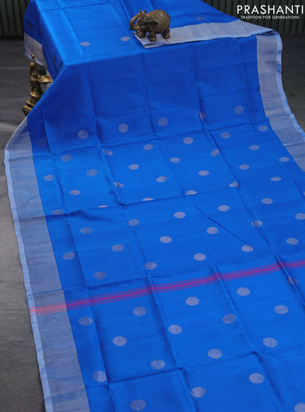 Pure uppada silk saree cs blue with silver zari woven coin buttas and silver zari woven border