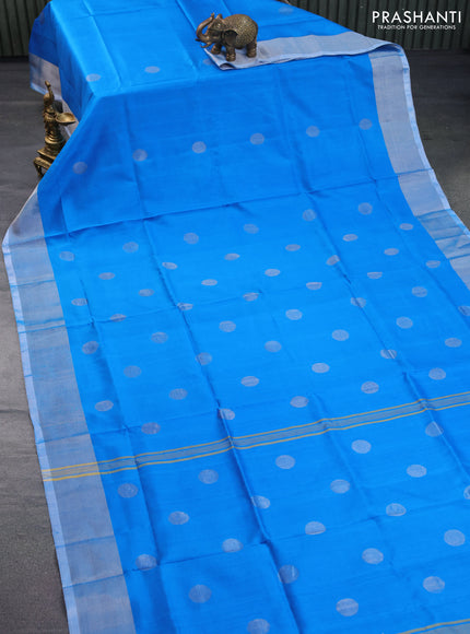 Pure uppada silk saree cs blue with silver zari woven coin buttas and silver zari woven border