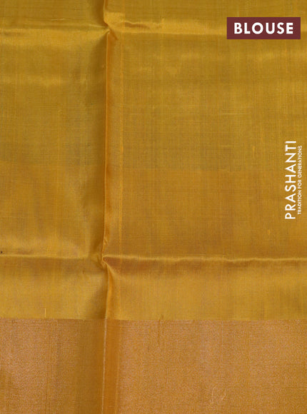 Pure uppada silk saree blue and mustard yellow with zari woven jamdhani buttas and zari woven border