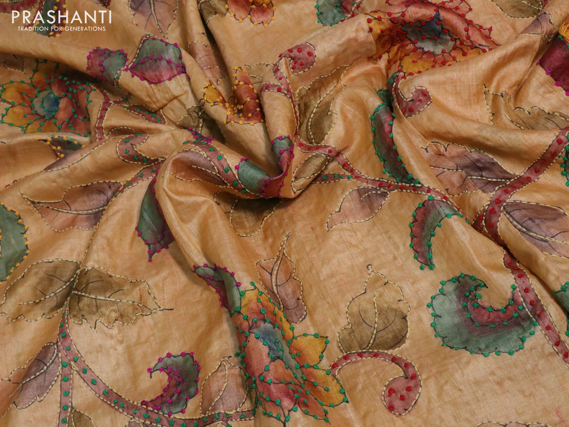 Pure tussar silk saree yellow shade and sandal with allover kalamkari prints & french knot work and piping border