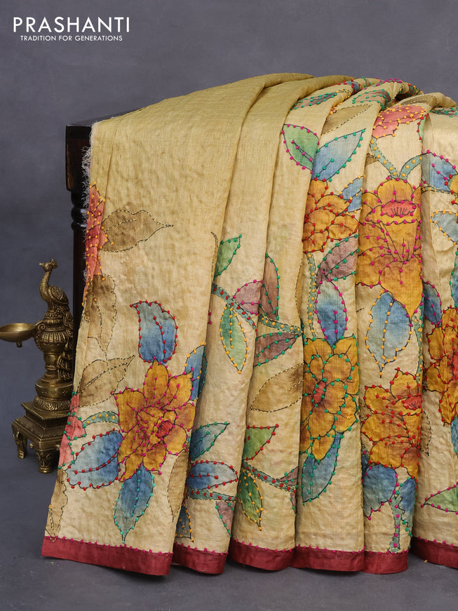 Pure tussar silk saree pale yellow and peach shade with allover kalamkari prints & french knot work and piping border