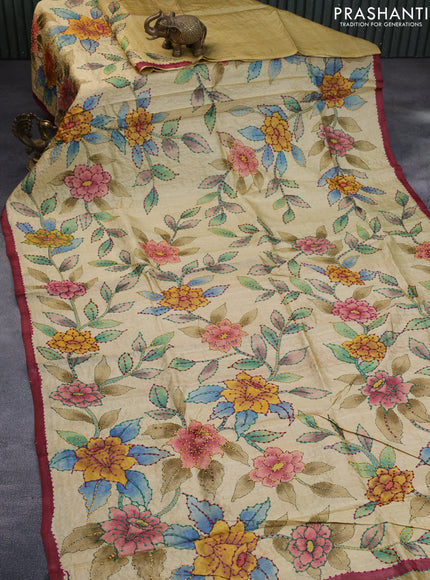 Pure tussar silk saree pale yellow and peach shade with allover kalamkari prints & french knot work and piping border