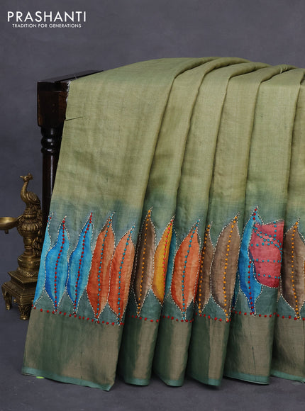 Pure tussar silk saree pastel green and pastel shade with leaf prints & french knot work and zari woven border