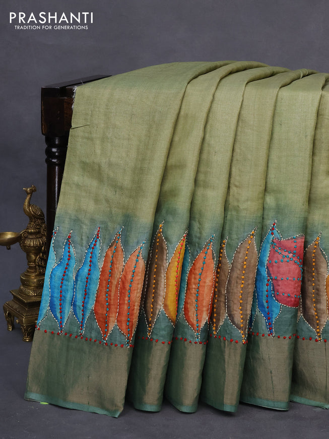 Pure tussar silk saree pastel green and pastel shade with leaf prints & french knot work and zari woven border