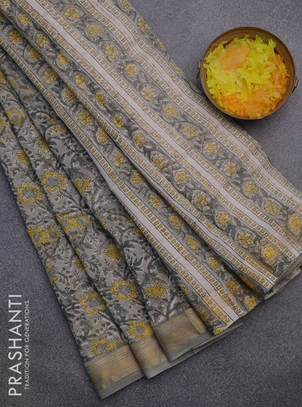 Chanderi bagru saree grey shade with allover floral prints and zari woven maheswari border