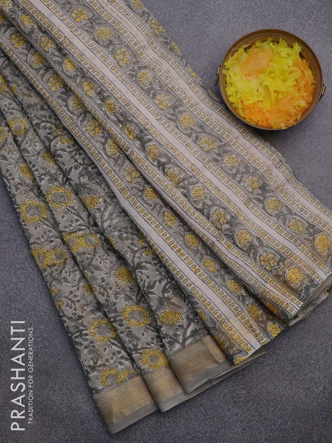 Chanderi bagru saree grey shade with allover floral prints and zari woven maheswari border