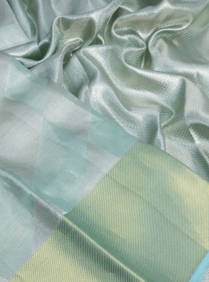 Pure kanchipuram tissue silk saree pastel blue shade with allover silver zari woven geometric weaves and zari woven border