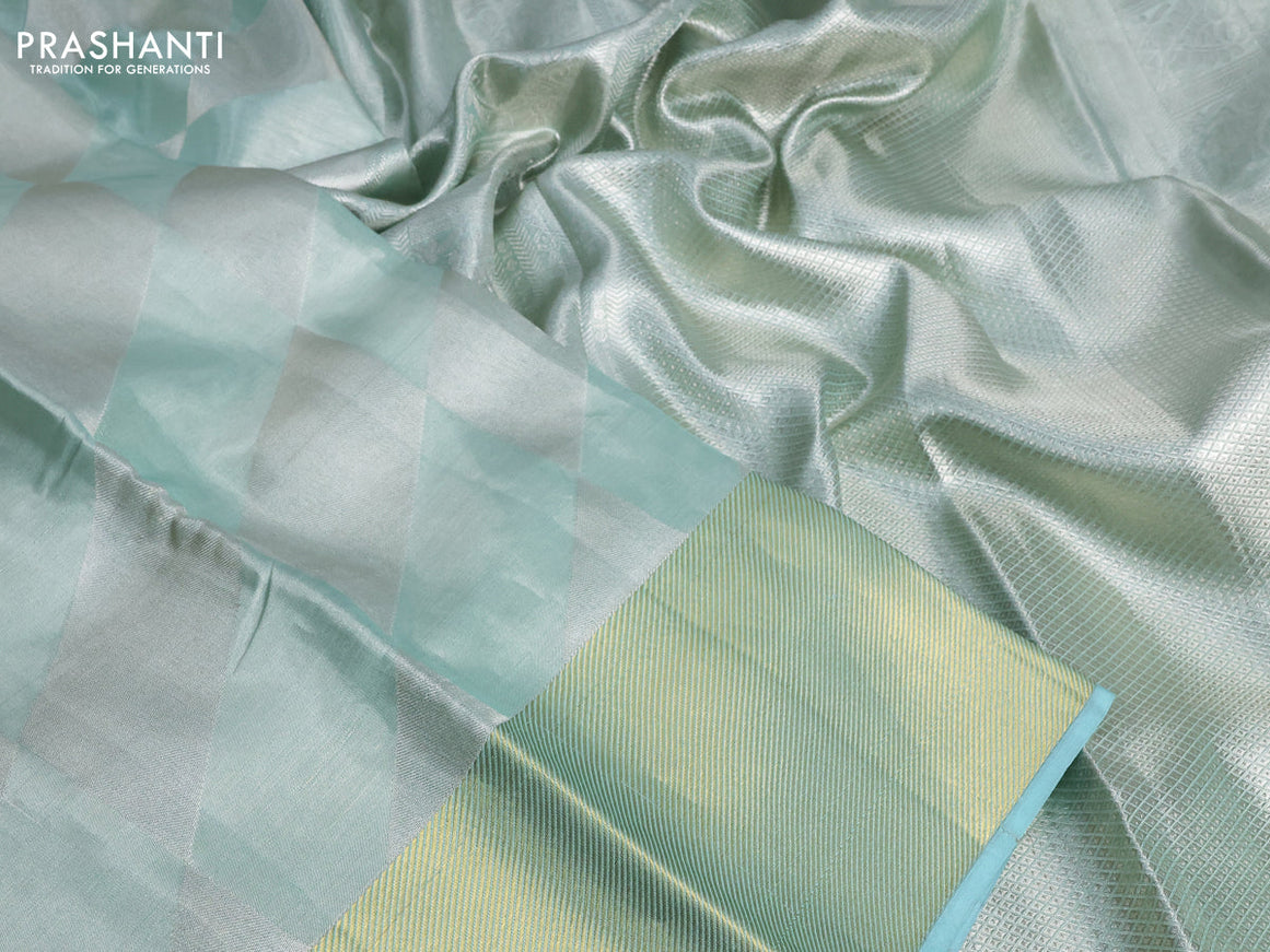 Pure kanchipuram tissue silk saree pastel blue shade with allover silver zari woven geometric weaves and zari woven border