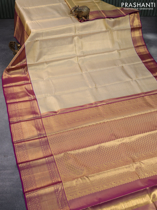 Pure kanchipuram tissue silk saree gold and deep purple with allover silver zari woven geometric weaves and zari woven border