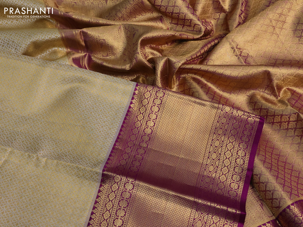 Pure kanchipuram tissue silk saree gold and deep purple with allover silver zari woven geometric weaves and zari woven border