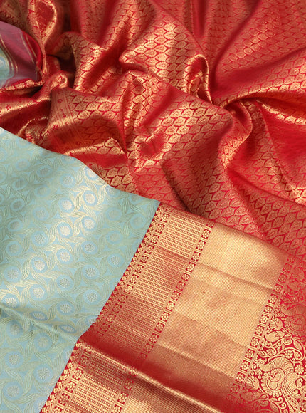 Pure kanchipuram tissue silk saree pastel blue shade and red with allover zari woven geometric weaves and long annam zari woven border