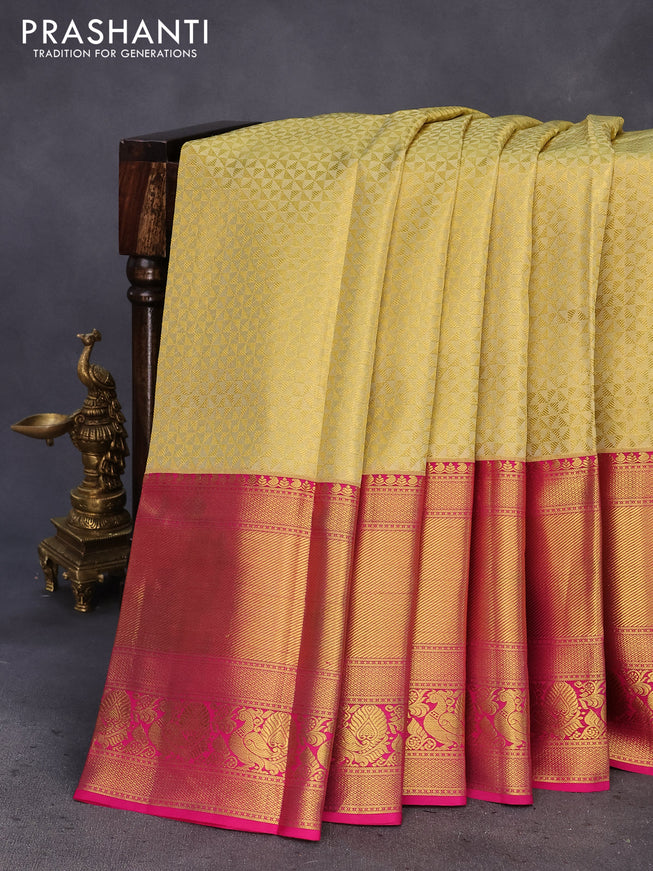 Pure kanchipuram tissue silk saree sandal and pink with allover zari woven geometric weaves and long annam zari woven border