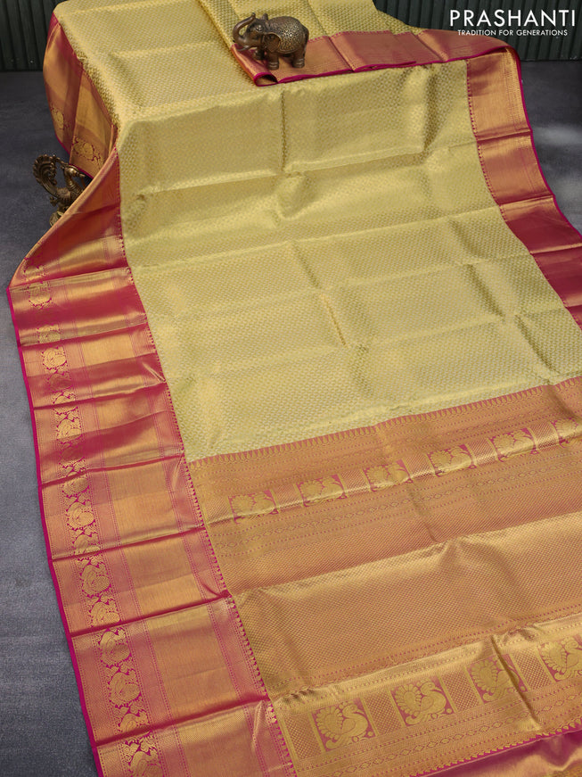 Pure kanchipuram tissue silk saree sandal and pink with allover zari woven geometric weaves and long annam zari woven border