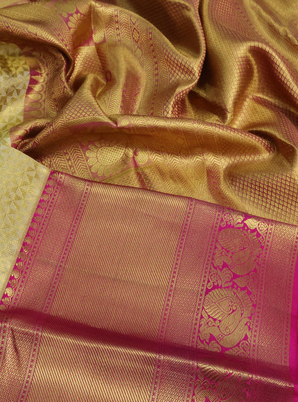 Pure kanchipuram tissue silk saree sandal and pink with allover zari woven geometric weaves and long annam zari woven border