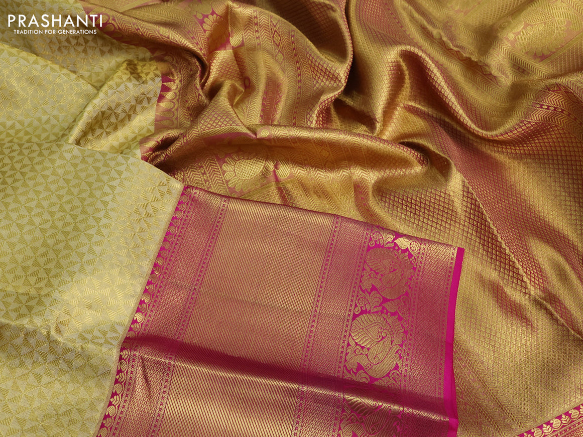 Pure kanchipuram tissue silk saree sandal and pink with allover zari woven geometric weaves and long annam zari woven border