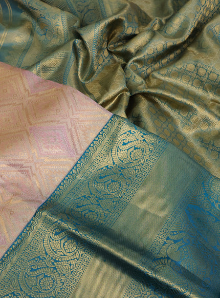 Pure kanchipuram tissue silk saree dual shade of peach pink and teal blue with allover zari woven geometric weaves and long annam zari woven border