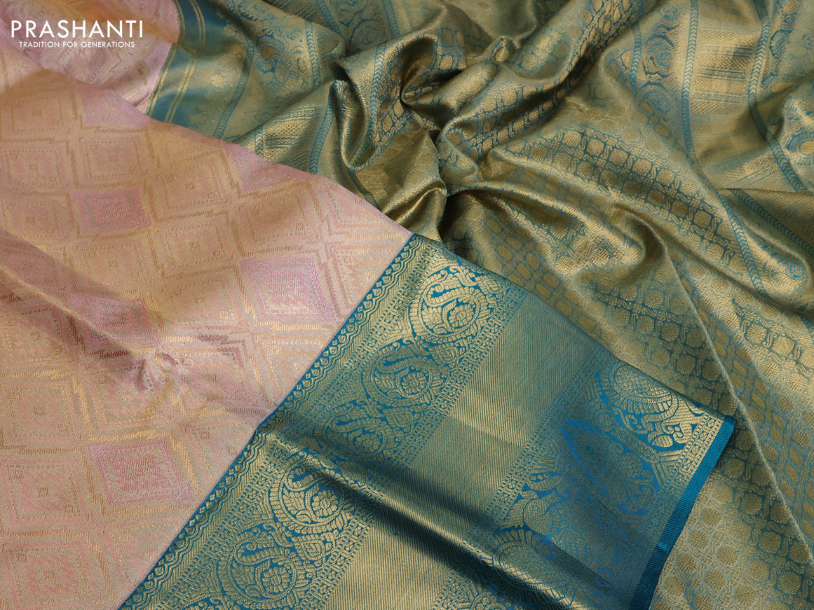 Pure kanchipuram tissue silk saree dual shade of peach pink and teal blue with allover zari woven geometric weaves and long annam zari woven border