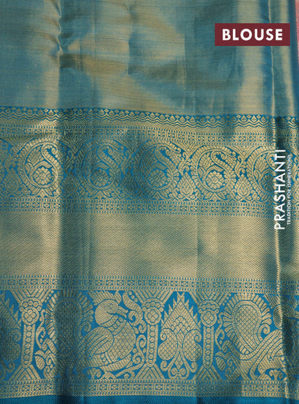 Pure kanchipuram tissue silk saree dual shade of peach pink and teal blue with allover zari woven geometric weaves and long annam zari woven border