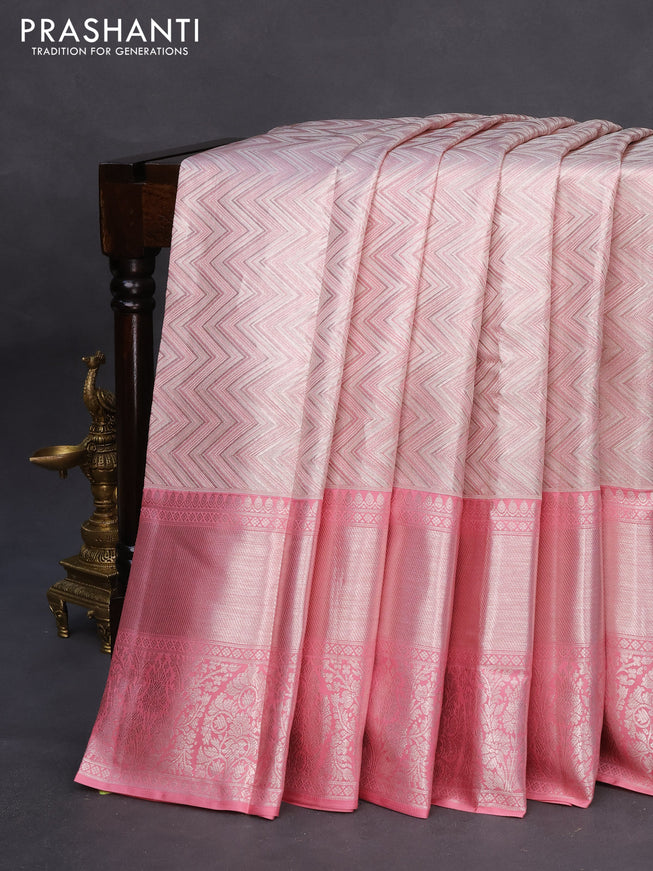 Pure kanchipuram tissue silk saree light pink with allover silver zari woven geometric weaves and long silver zari woven border