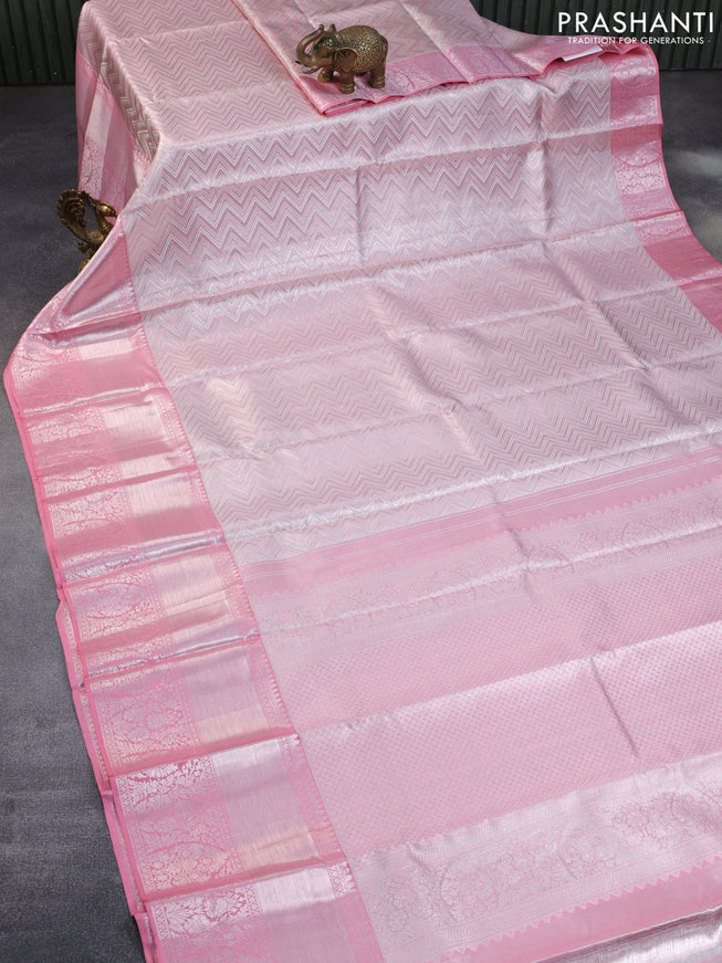 Pure kanchipuram tissue silk saree light pink with allover silver zari woven geometric weaves and long silver zari woven border