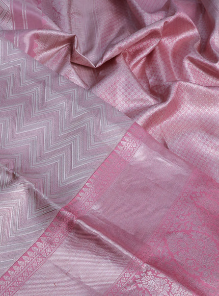 Pure kanchipuram tissue silk saree light pink with allover silver zari woven geometric weaves and long silver zari woven border