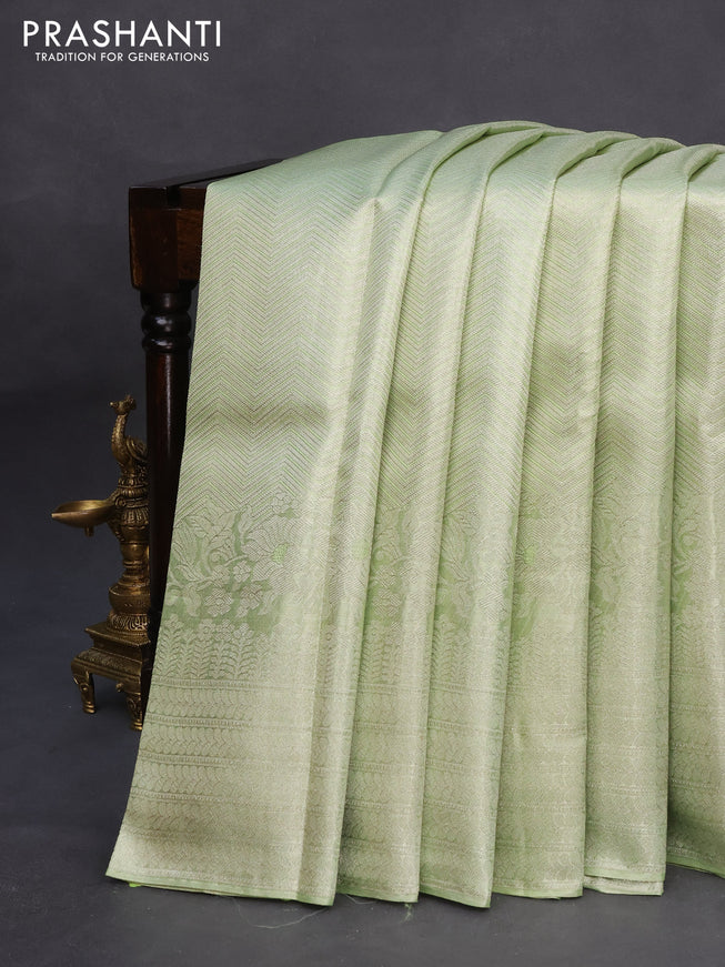 Pure kanchipuram tissue silk saree pista green with allover silver zari weaves and long silver zari woven border