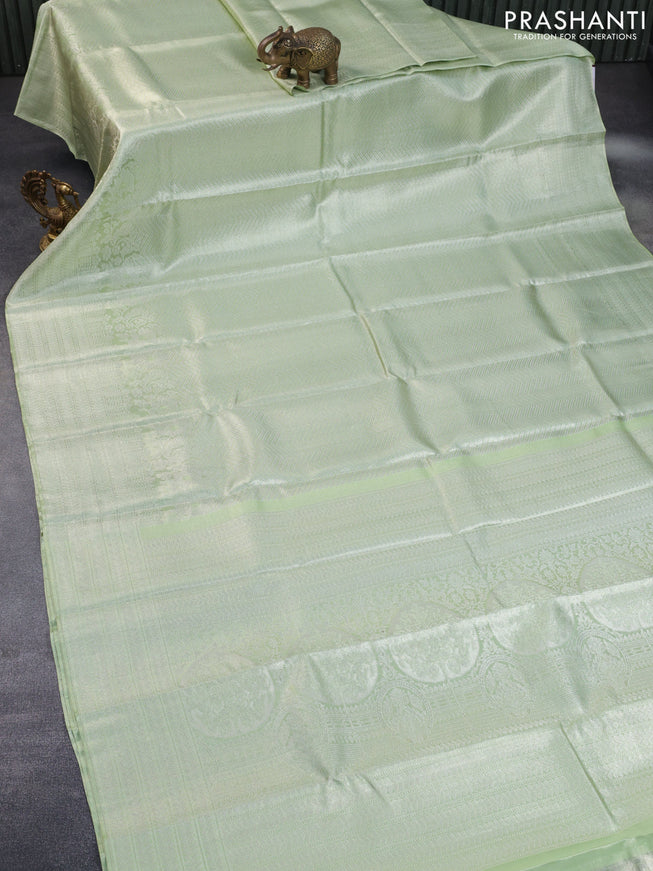 Pure kanchipuram tissue silk saree pista green with allover silver zari weaves and long silver zari woven border