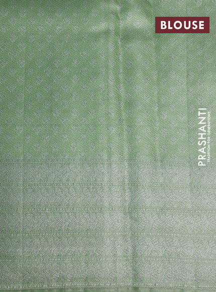 Pure kanchipuram tissue silk saree pista green with allover silver zari weaves and long silver zari woven border