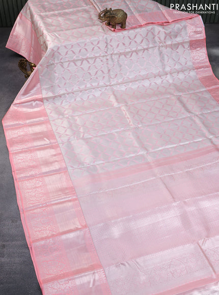 Pure kanchipuram tissue silk saree pastel grey and peach pink with allover silver zari weaves and long silver zari woven border