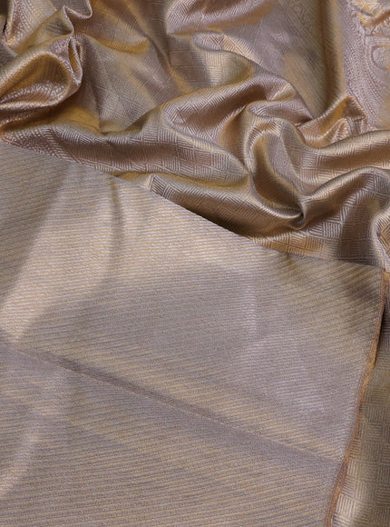 Pure kanchipuram tissue silk saree dual shade of gold with allover zari weaves in borderless style