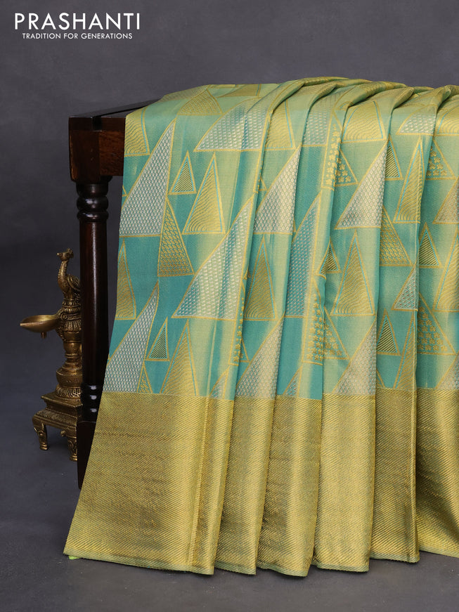 Pure kanchipuram tissue silk saree dual shade of teal blue with allover zari woven geometric weaves and zari woven border