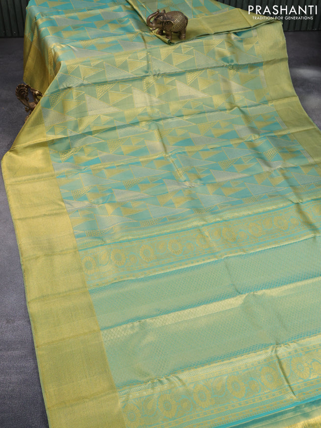 Pure kanchipuram tissue silk saree dual shade of teal blue with allover zari woven geometric weaves and zari woven border